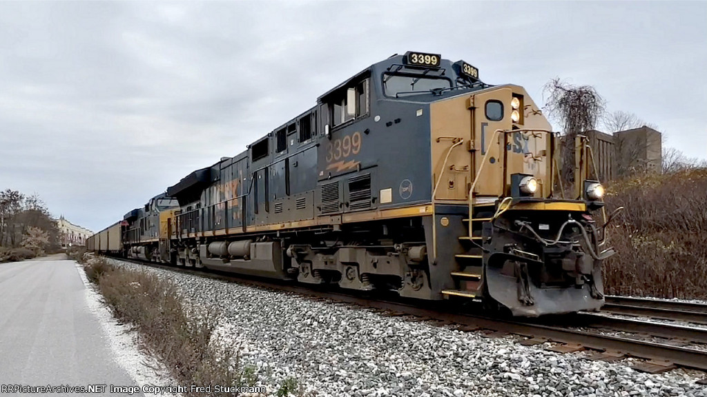 CSX 3399 leads westbound hoppers.